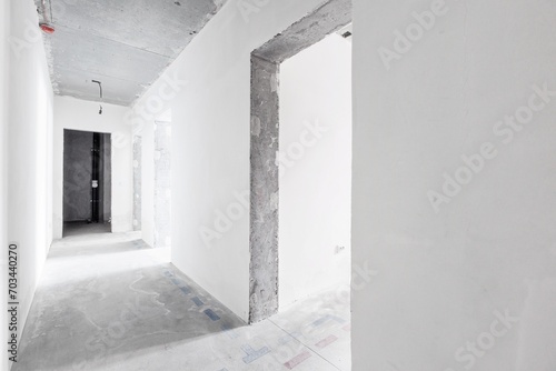 interior of the apartment without decoration in gray colors. rough finish