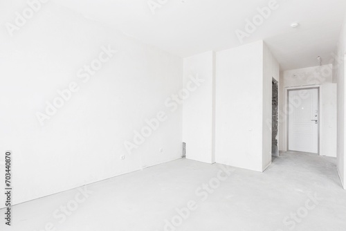interior of the apartment without decoration in gray colors. rough finish