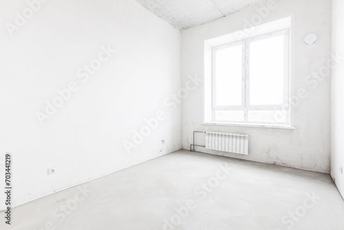 interior of the apartment without decoration in gray colors. rough finish