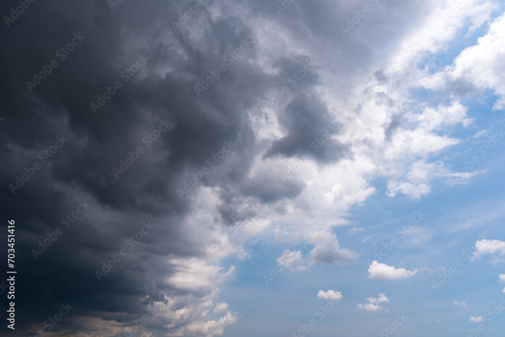 Obraz premium Dark sky with stormy clouds. Dramatic sky rain,Dark clouds before a thunder-storm.