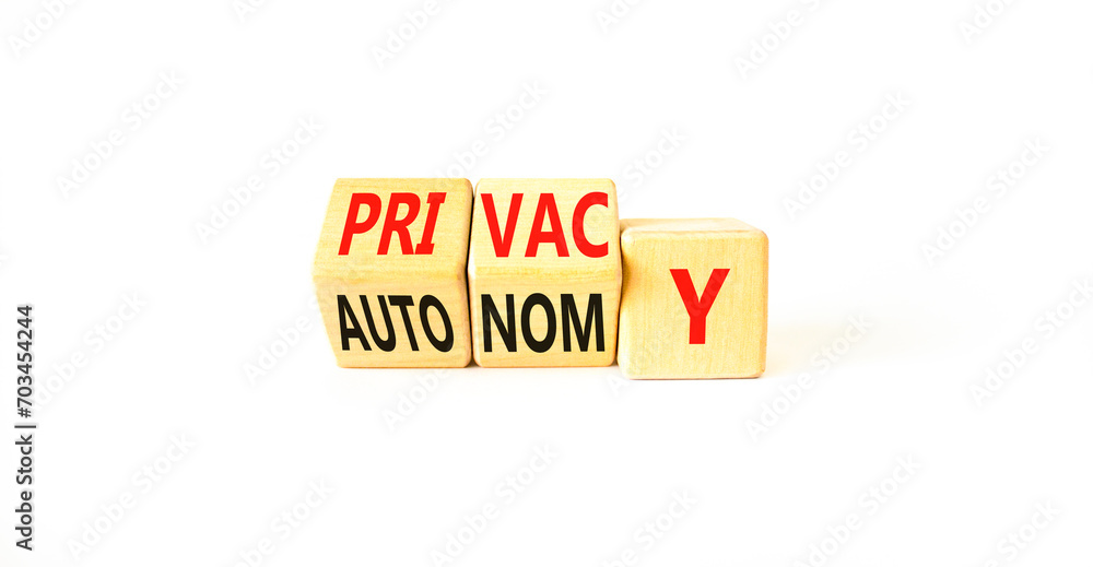 Privacy or autonomy symbol. Concept word Privacy or Autonomy on wooden cubes. Beautiful white table white background. Business privacy or autonomy concept. Copy space. Privacy or autonomy symbol. Concept word Privacy or Autonomy on wooden cubes. Beautiful white table white background. Business privacy or autonomy concept. Copy space.
