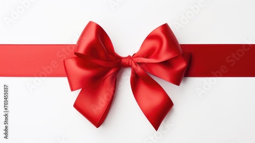 Red silky ribbon and bow isolated on white background