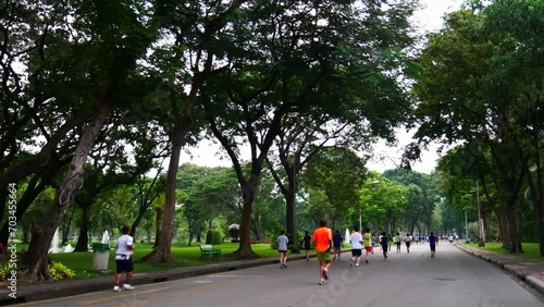 Wallpaper Mural Asians jogging in public park Torontodigital.ca