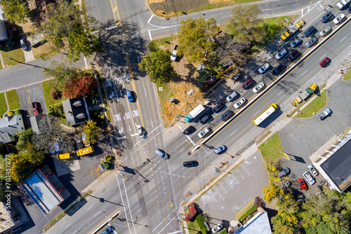 Fototapeta Naklejka Na Ścianę i Meble -  New Jersey, USA, aerial view of beautiful small American town near an active road with cars