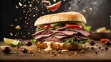 a roast beef sandwich falling into the air