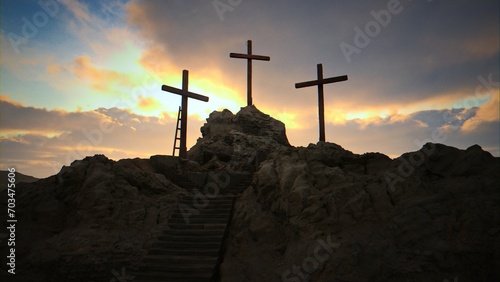 A sunny, beautiful sunrise/sunset at Golgotha on Easter morning featuring three crosses.