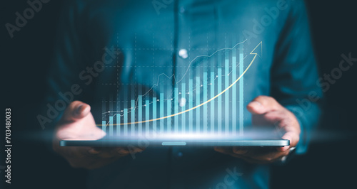 business, chart, graph, growth, success, analysis, diagram, digital, finance, investment. close up to hand of businessman, hold the bar chart from finance investment on tablet, direct variation graph.