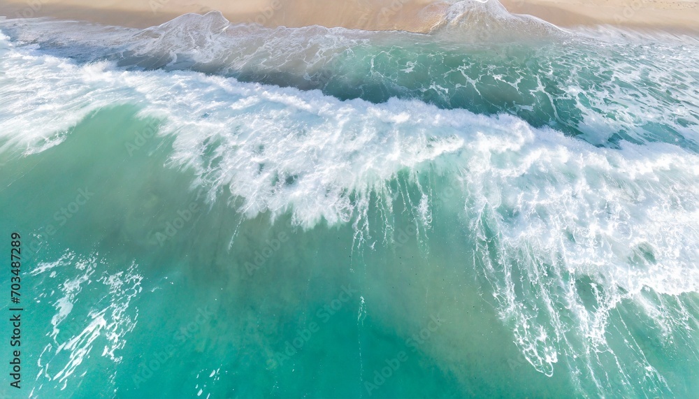 overhead photo of crashing waves on the shoreline tropical beach surf abstract aerial ocean view