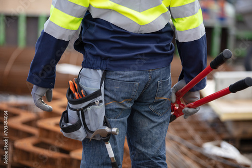 builder working on building site