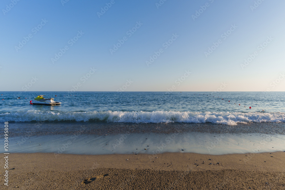 empty jetski in the water at the beach