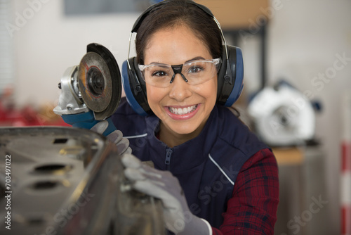 happy woman doing hard job in car