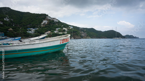 Taganga - Santa Marta, Magdalena, Colombia. Traditional fishing boats in the touristy bay of Taganga