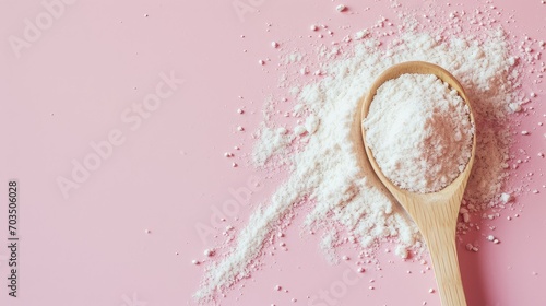 Collagen powder on pink background. Extra protein intake. Natural beauty and health supplement for skin, bones, joints and gut. Banner, Flat Lay, top view. Copy space for text.