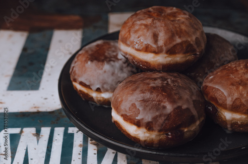 Traditional Polish yeast donuts with icing, Fat Thursday, Vegan
