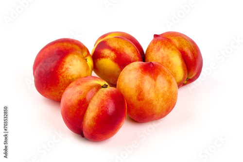 Sweet juicy apricots, ripe nectarines, isolated on white background.