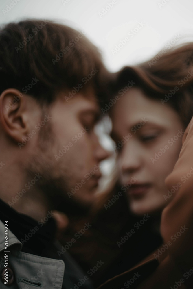 abstract soft focus blurred photo of a couple in love, gloomy and sad. Cinematic love story