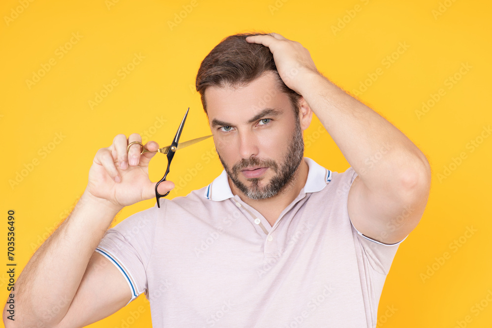 Men hairstyle, haircut. Middle aged man with scissors cut hair. Men haircare, beauty barber concept. Bearded guy, with scissors. Cut hair with scissors. Mans hair styling and cut hair with scissors. Men hairstyle, haircut. Middle aged man with scissors cut hair. Men haircare, beauty barber concept. Bearded guy, with scissors. Cut hair with scissors. Mans hair styling and cut hair with scissors.