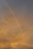 rainbow in the sunset sky