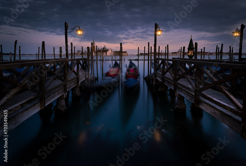 Venetian gondolas in the Canal Grande at night