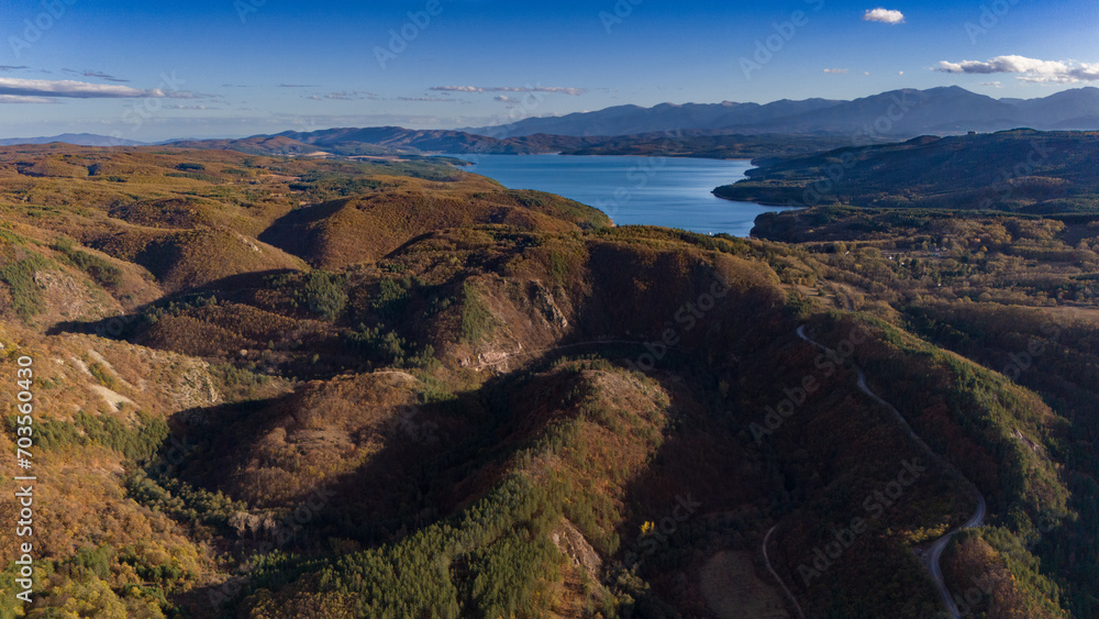 Aerial Autumn overview of Iskar Dam with its canyon