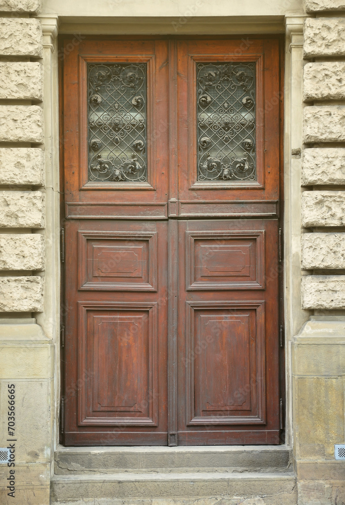 The texture of the old wooden door. Outdoor view