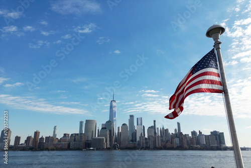 USA flag. Memorial Day, Veteran's Day, 4th of July. American Flag Waving near New York City, Manhattan view. Independence Day. Labor, Flag, Patriots, President Day.