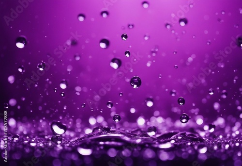Water drops floating on a purple background