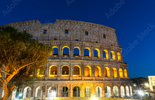Exterior Architectural Sights of The Roman Colosseum (Colosseo Romano) in Rome, Lazio Province, Italy. (At Night).