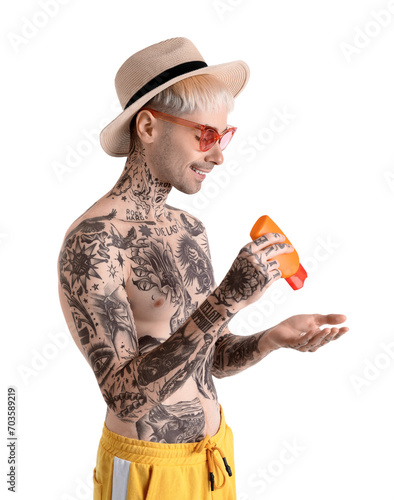 Tattooed man with sunscreen...