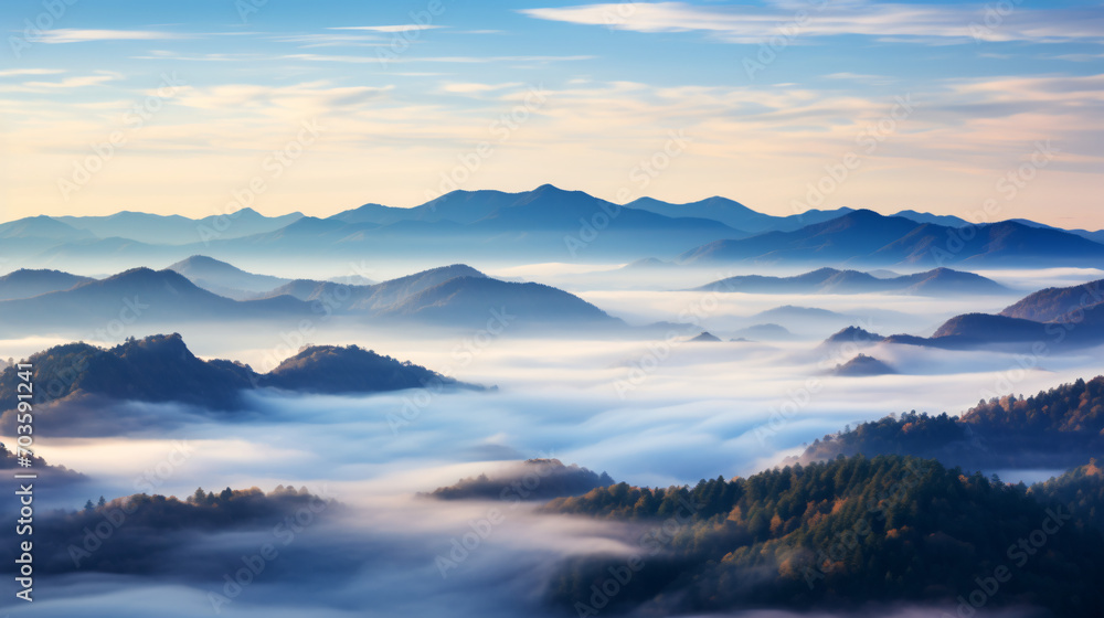 A panoramic view of a mountain range at sunrise with the peaks bathed in a rosy glow and valleys shrouded in mist.