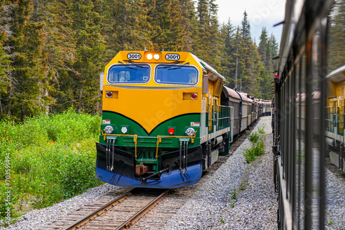 Diesel locomotive of the historic White Pass and Yukon Route railroad heading towards Canada from Skagway, Alaska photo