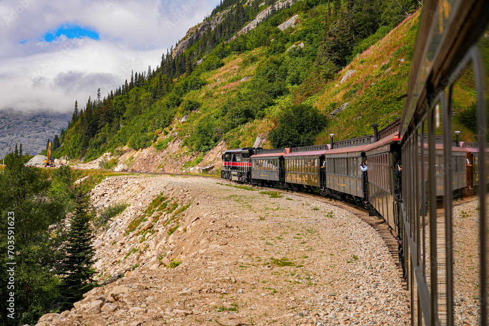 Narrow-gauge train of the White Pass and Yukon Route in the Alaskan mountains between Skagway and Canada