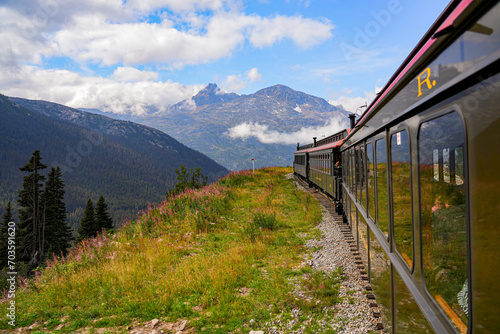 Narrow-gauge train of the White Pass and Yukon Route in the Alaskan mountains between Skagway and Canada