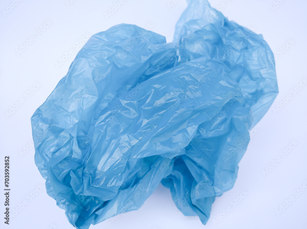 Blue shopping plastic bag isolated on white background