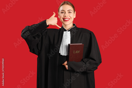 Young judge with law book s...