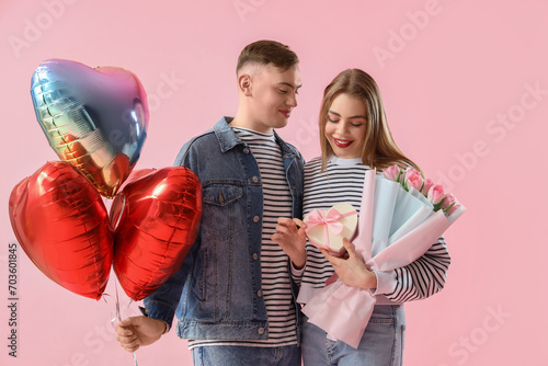 Happy young couple with hea...