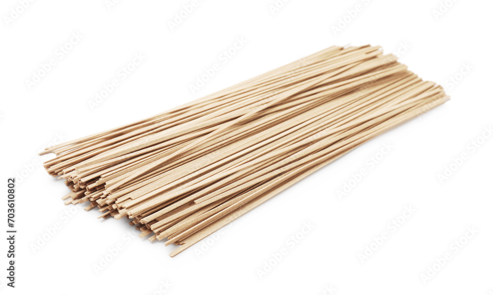 Uncooked buckwheat noodles (soba) isolated on white Uncooked buckwheat noodles (soba) isolated on white