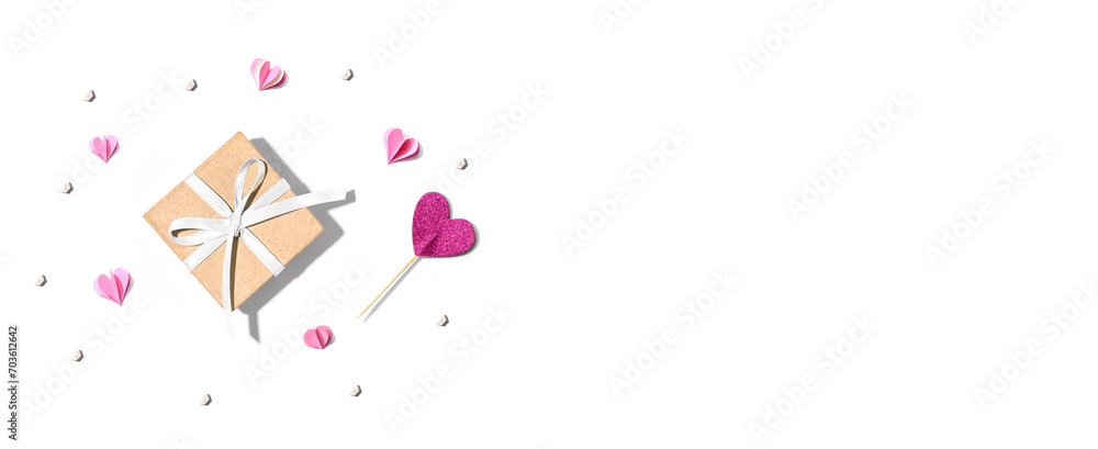 Valentines day or Appreciation theme with a gift box and paper craft hearts Valentines day or Appreciation theme with a gift box and paper craft hearts