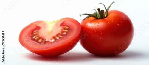 cut half red tomato and fresh tomato fruit isolated white background. copy space