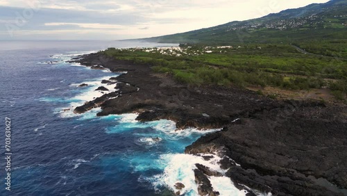 Waves on volcanic rocks at Etang Sale at Reunion Island