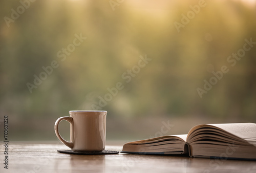 Book coffee or tea on a table, relax and read  at hone concept  photo