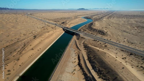 Dramatic aerial view of the all-American canal traveling through the Buttercup sand dunes in imperial county California.