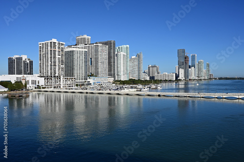 Residential waterfront buildings and Venetian Causeway on Biscayne Bay in Miami, Florida on clear calm sunny December morning.. © Francisco