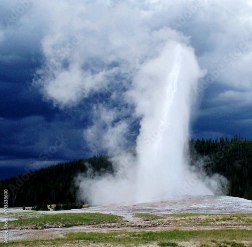 Spectacular panoramic views at Old Faithful Geyser in Yellowstone National Park, Wyoming Montana. Great hiking. Summer wonderland to watch wildlife and natural landscape. Geothermal.