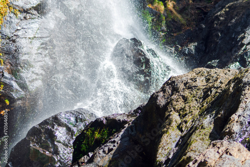 waterfall on the rocks © Htike