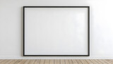 Mockup-of-a-square-black-frame-leaning-in-a-white-interior-with-a-hardwood-floor