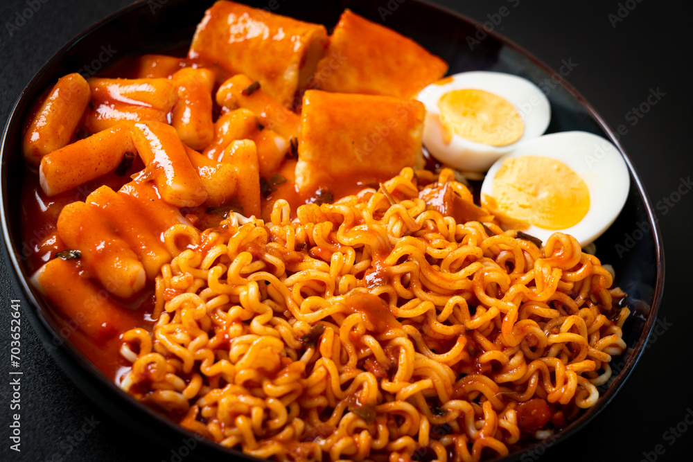 Korean instant noodles with Korean rice cake and fish cake and boiled egg Korean instant noodles with Korean rice cake and fish cake and boiled egg