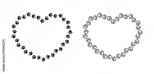 Heart shaped frame made of animal paw prints with empty space for your text and images. Cute Valentines, animal lover dog paw print border.