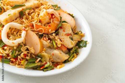 Instant noodle spicy salad with mixed meats