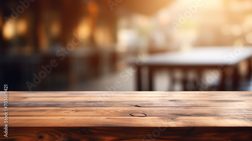empty wood table with blur cafe or coffee shop background